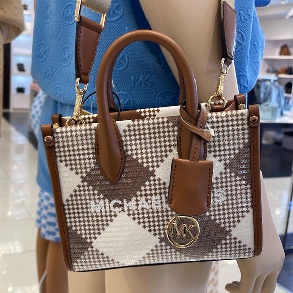 Michael Kors Mirella Extra-Small Logo Crossbody XBODY Shopper Bag
Luggage
NWT - Picture 11 of 16